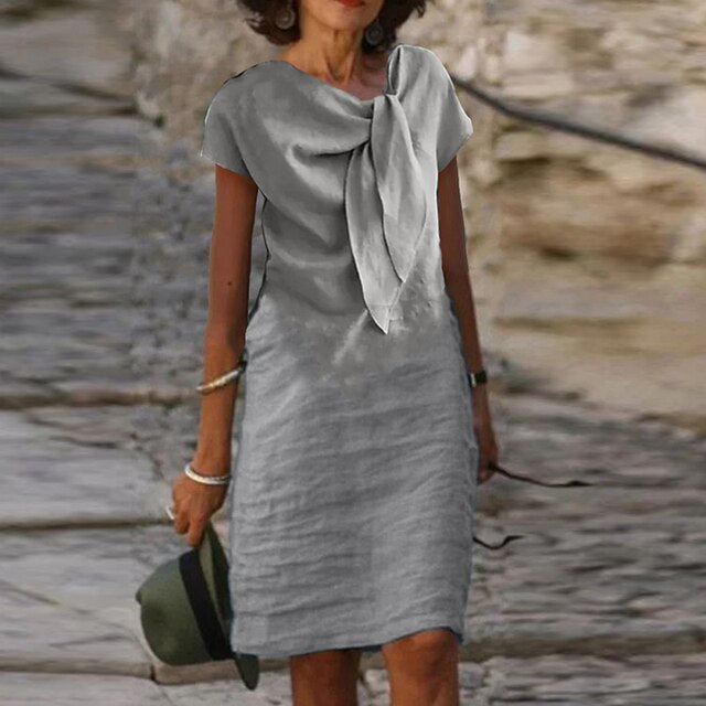 Women’s Evening Dress – Mini Length – Relaxed Fit – Short Sleeve – Statement Bow