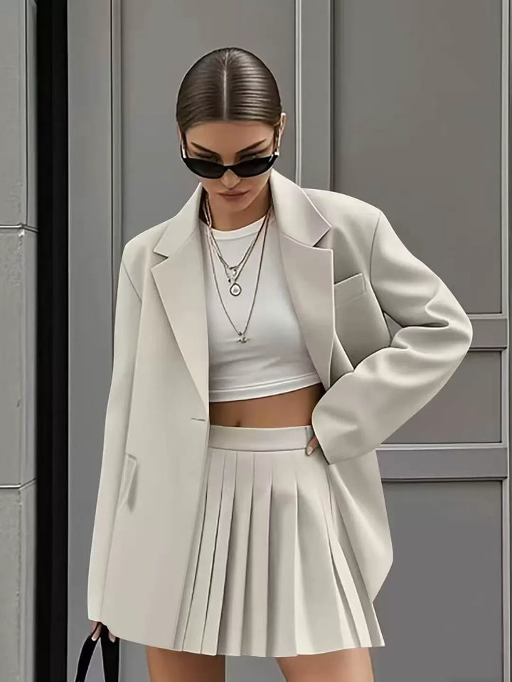 Women's Pleated Skirt Suit Set – Relaxed Fit Blazer – High-Waist Mini – Flap Pocket Design